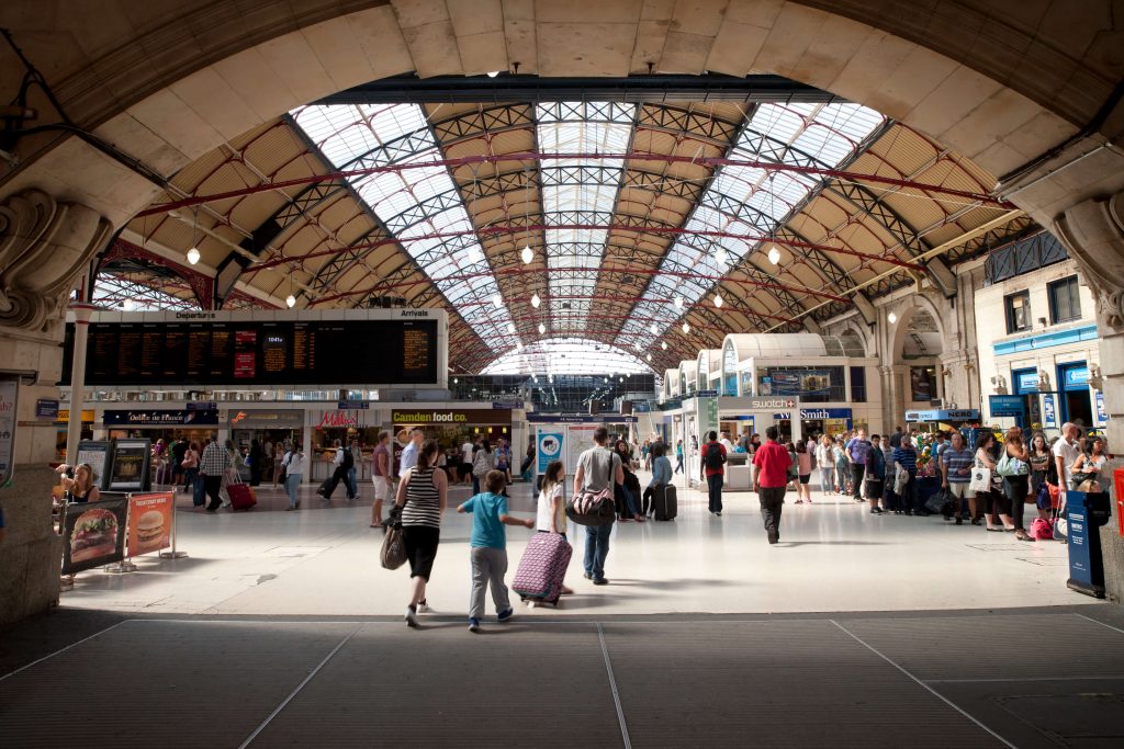 London Victoria Station concourse, with passengers