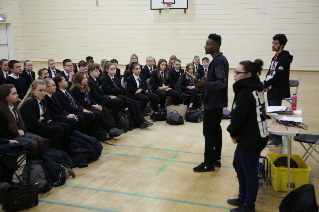 Students at Rushden Academy gathered for a workshop in a school hall