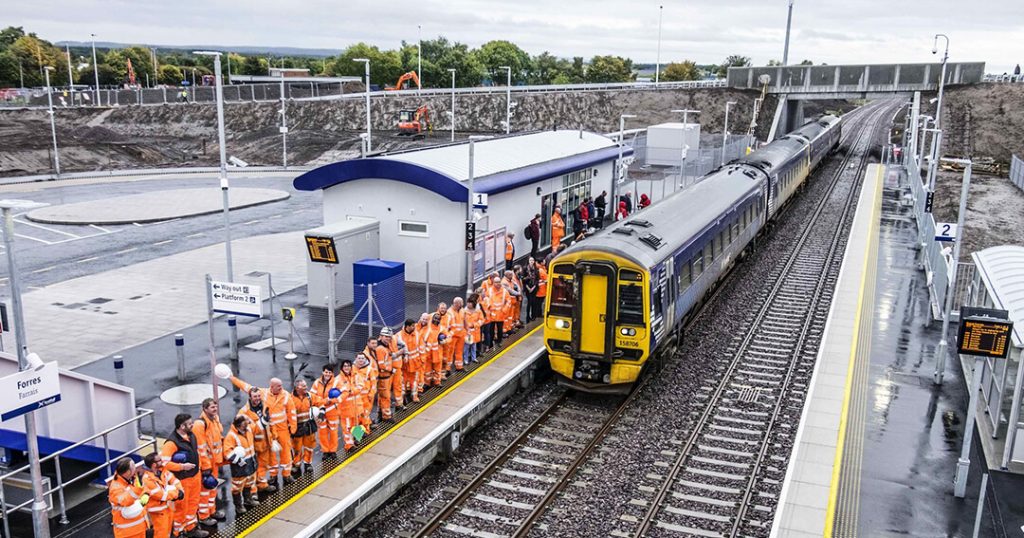 The project team welcome the first train at the newly relocated Forres station
