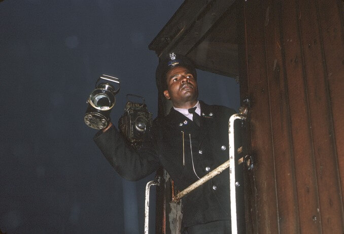 Black guard in a brake van 1962