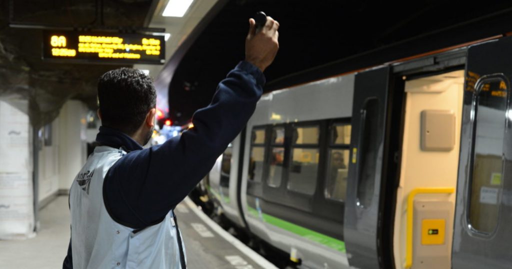 a train dispatcher on a platform