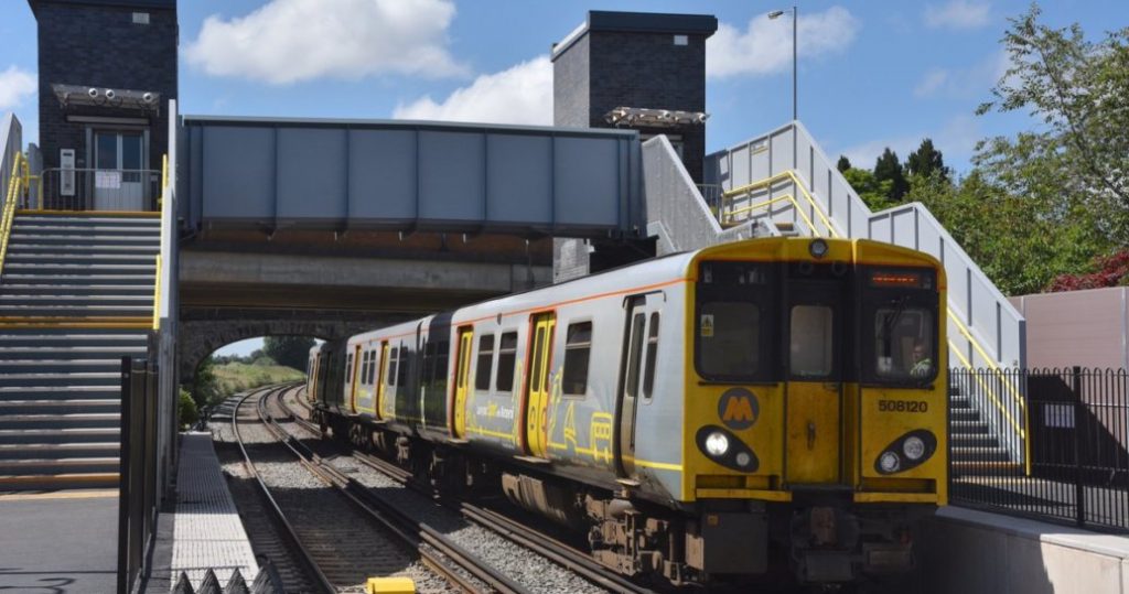 A train passing through the new Maghull railway station