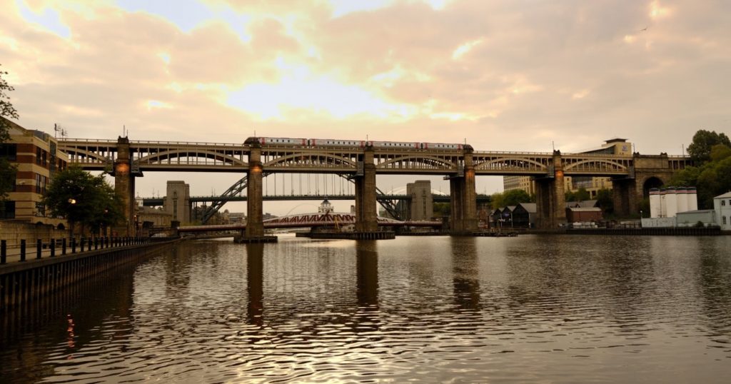 Landscape view of the High Level Bridge at sunset