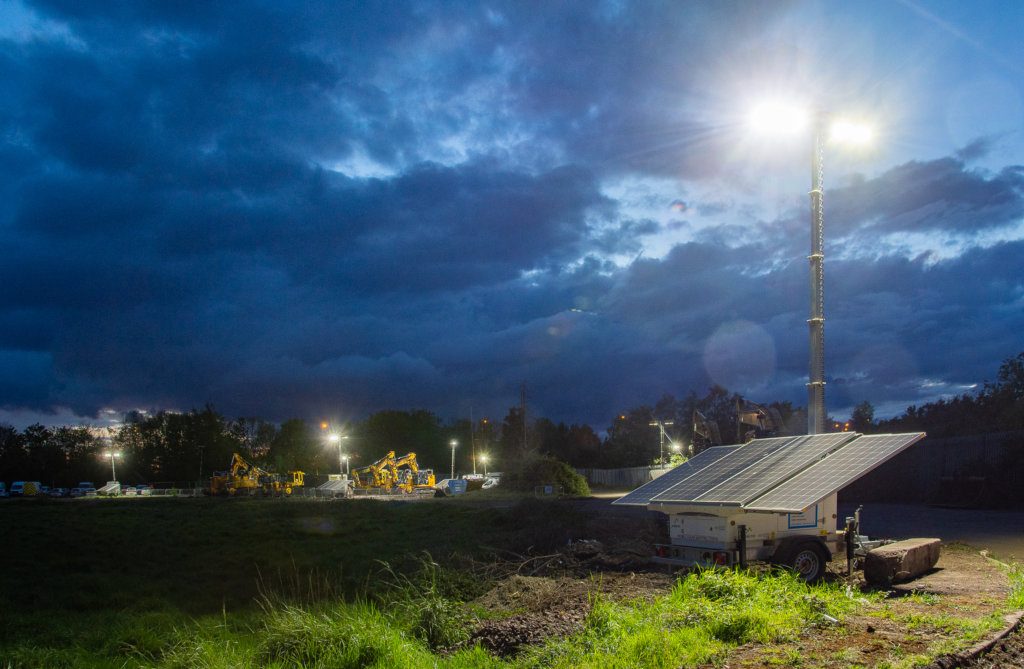 Solar panels help power a railway project in Wales, nighttime