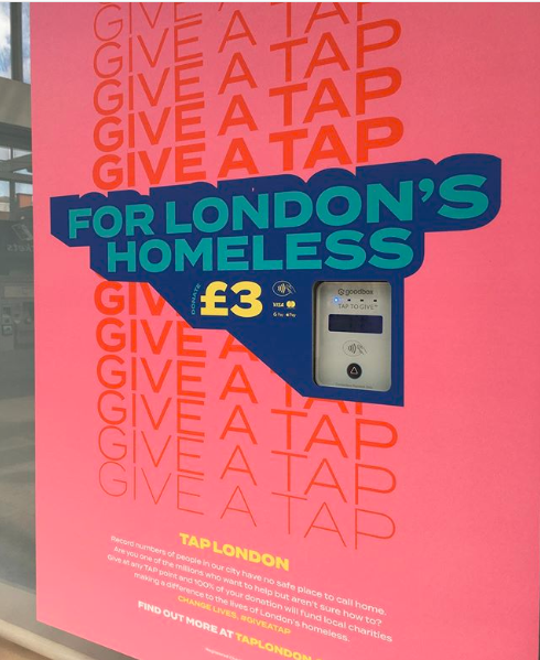 Contact donation point for London's homeless at a railway station