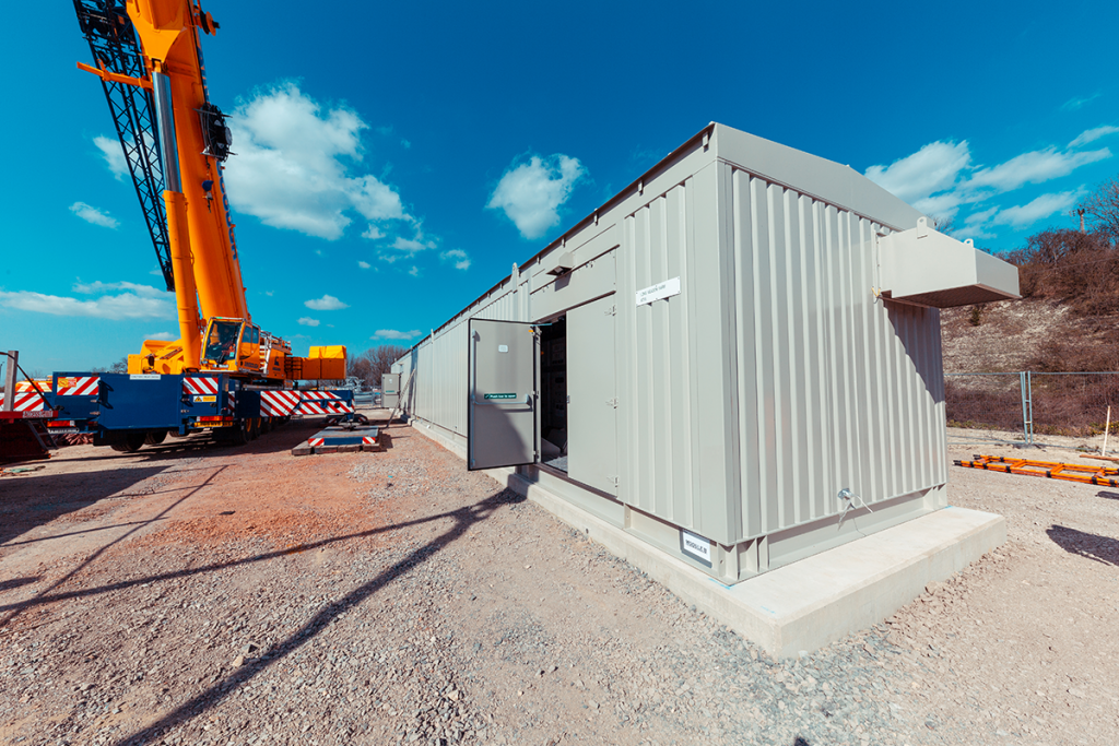 Substation building along the Midland Main Line with machinery next to it