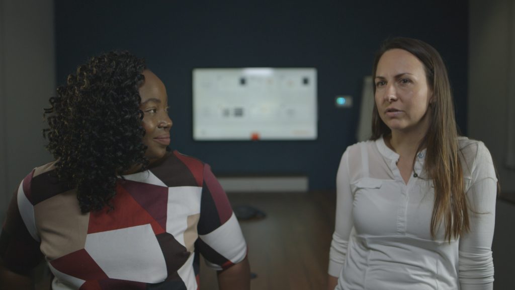 Engineers Emily Pollard and Dorota Durazinska in a meeting room 