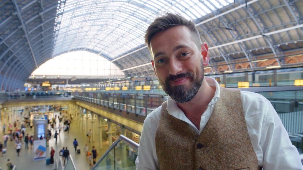 Presenter Tim Dunn under the roof at London St Pancras International station, daytime