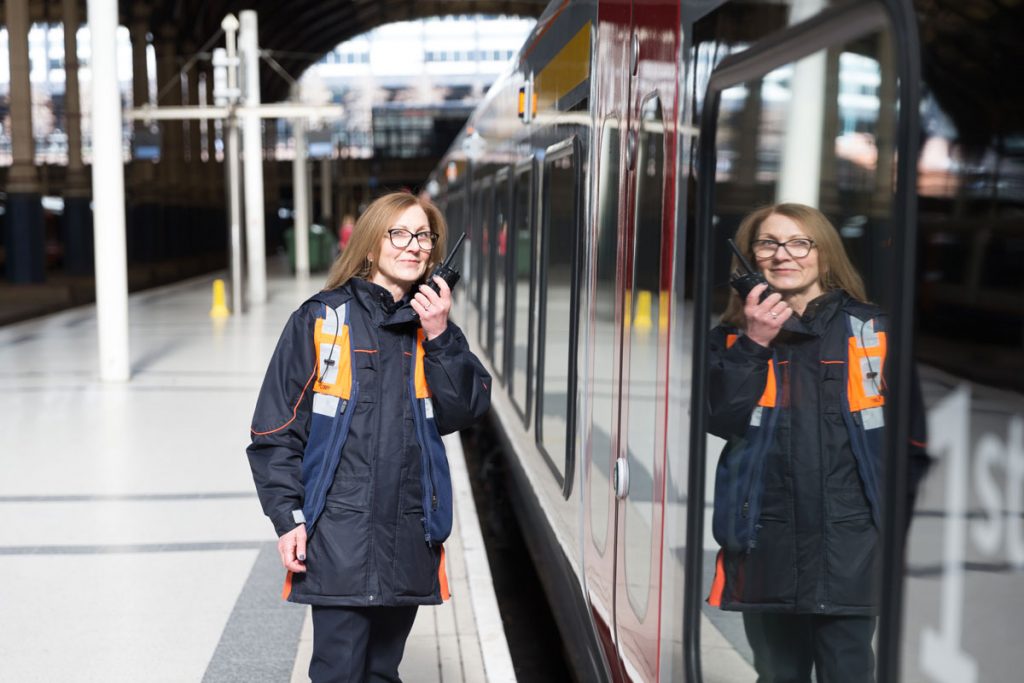 Station guard on walkie talkie