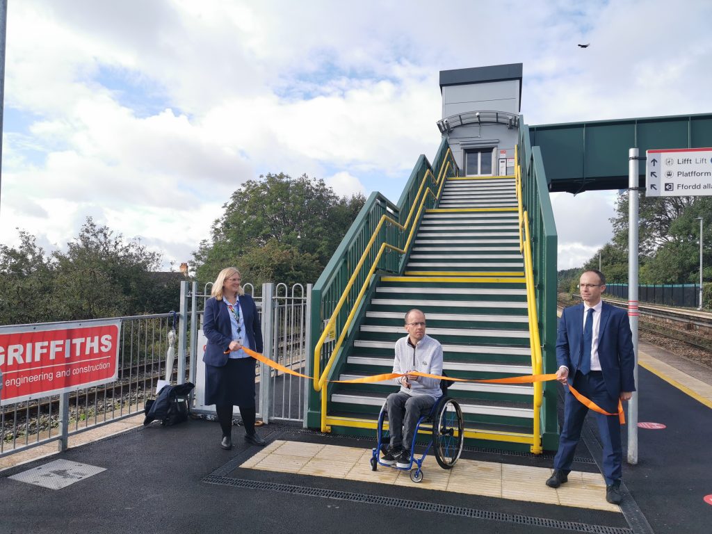 Three people opening the station at Cadoxton station in south Wales