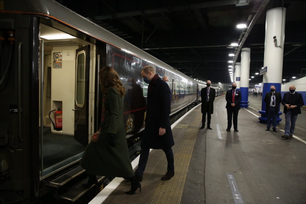 The Duke and Duchess of Cambridge stepping onto a train