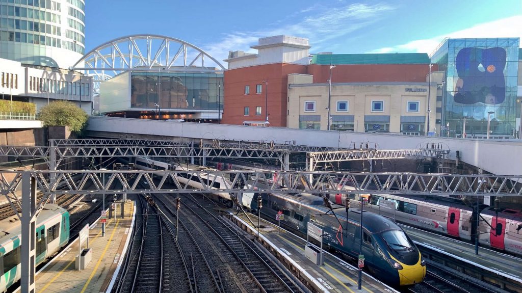 Three trains just outside Birmingham New Street station, daytime