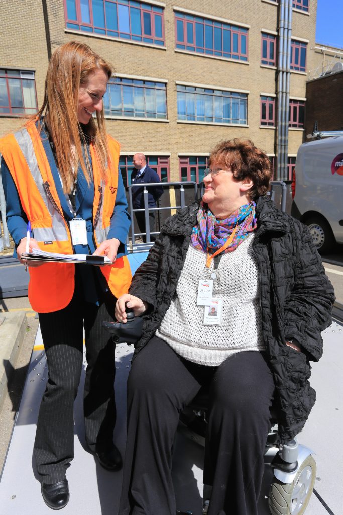 Margaret Hickish and a colleague talk at the testing of the Thameslink Programme platforms for accessibility, daytime