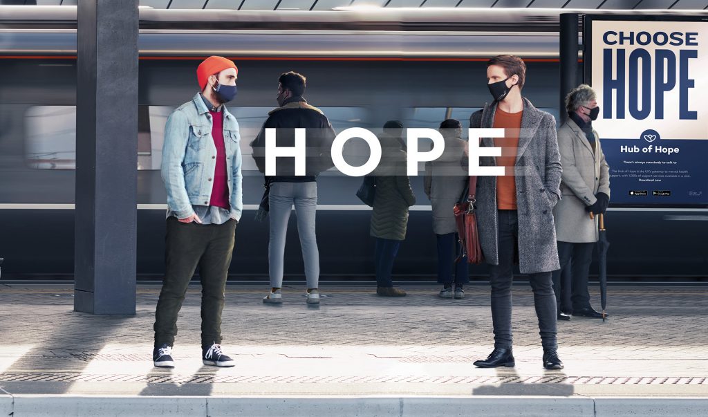 There is Always Hope campaign image of mental health awareness campaign - two men standing on a railway station platform