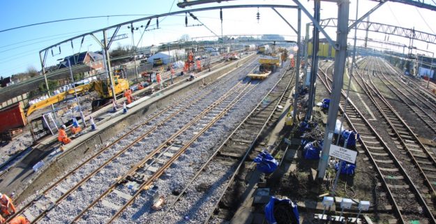 Landscape view of the Clacton resignalling project, including tracks and overhead line equipment structures
