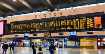 British Sign Language Screens viewed from the concourse at London Euston