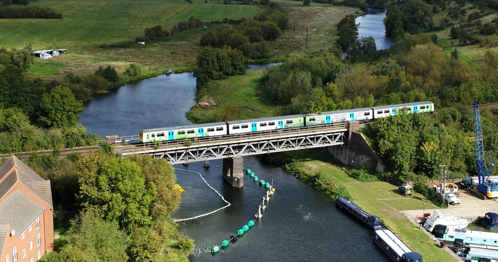 HydroFLEX train travelling over the River Avon, daytime