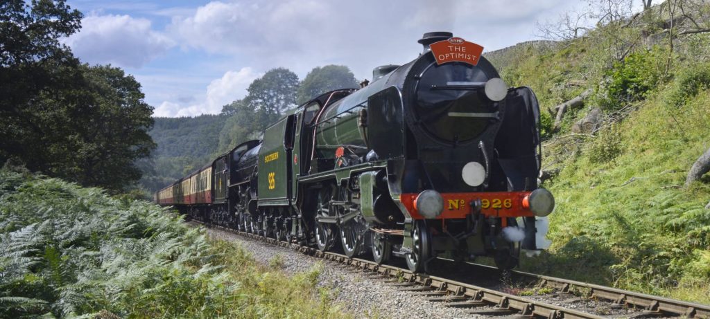 A steam train on the North Yorkshire Moors Railway, daytime