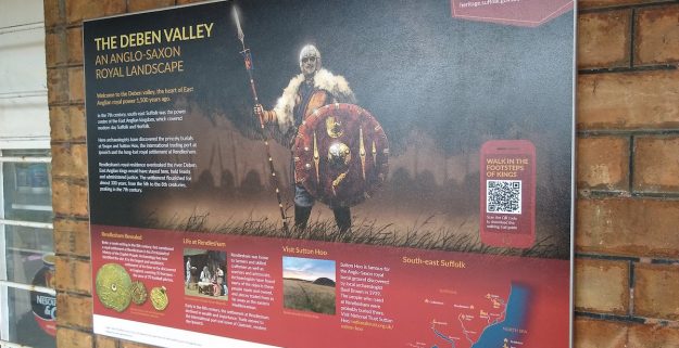 An information board with the image of an Anglo-Saxon about the history of the South-east Suffolk area