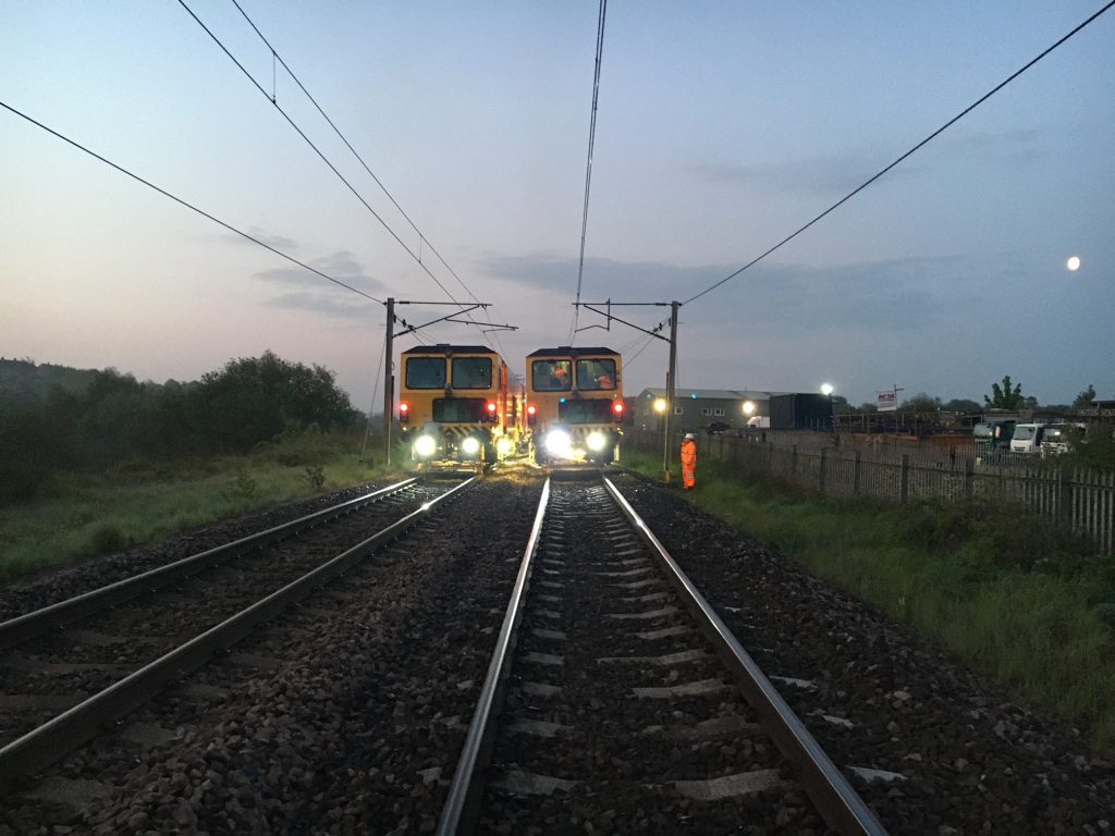 Tamping trains tamping ballast in South Carlisle