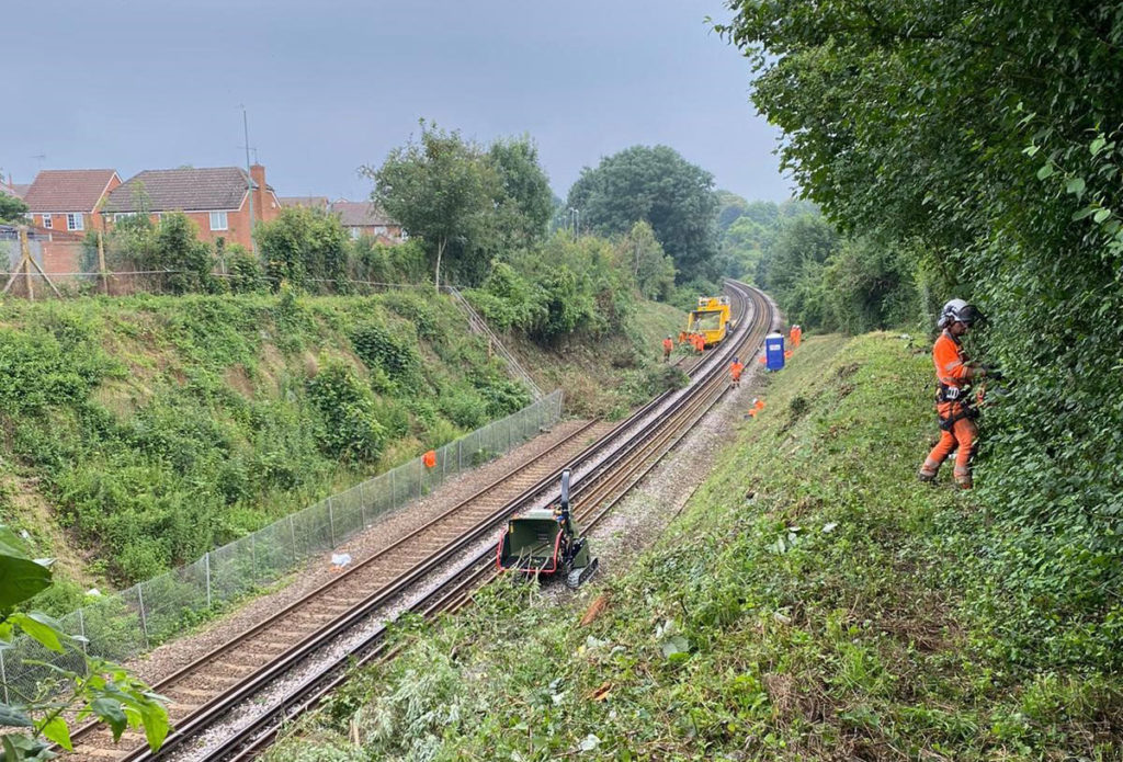 Engineers working on the side of the railway at Bearsted to prevent future landslips