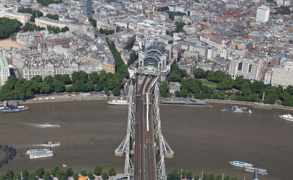 Aerial view of London Charing Cross station and the Hungerford Bridge, daytime