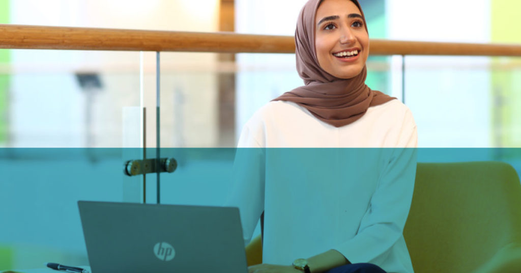 Year in industry student working in an office on a laptop