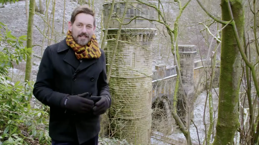 Presenter Tim Dunn in front of the Victorian Bramhope Tunnel during the winter, daytime
