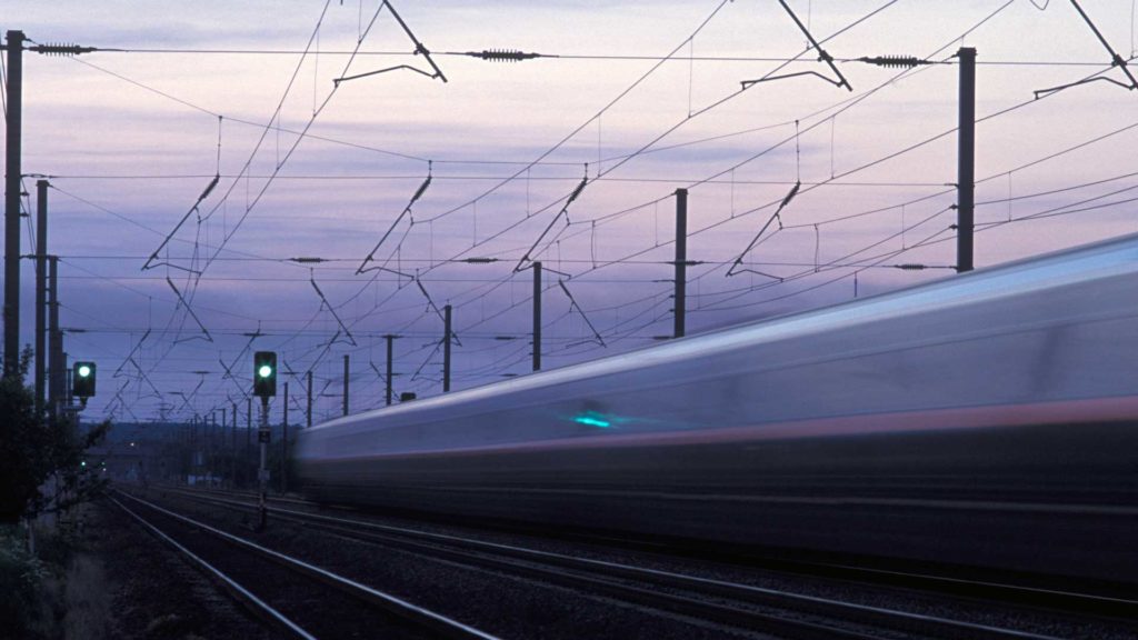 train travelling at speed along a track