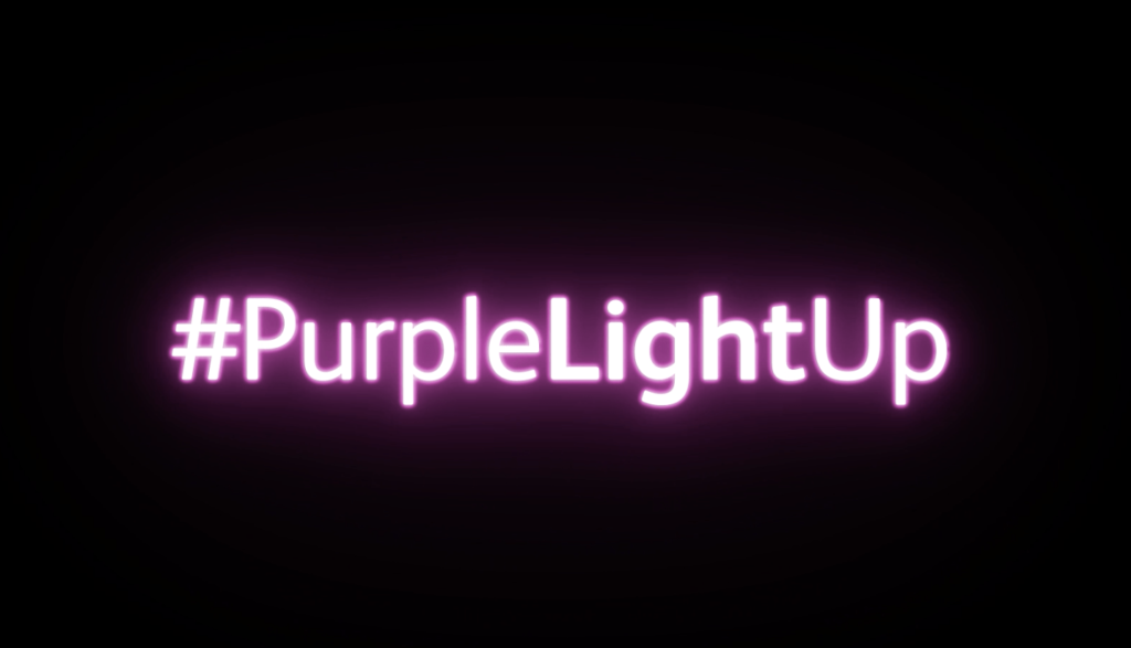 The text 'purple light up' in neon effect
