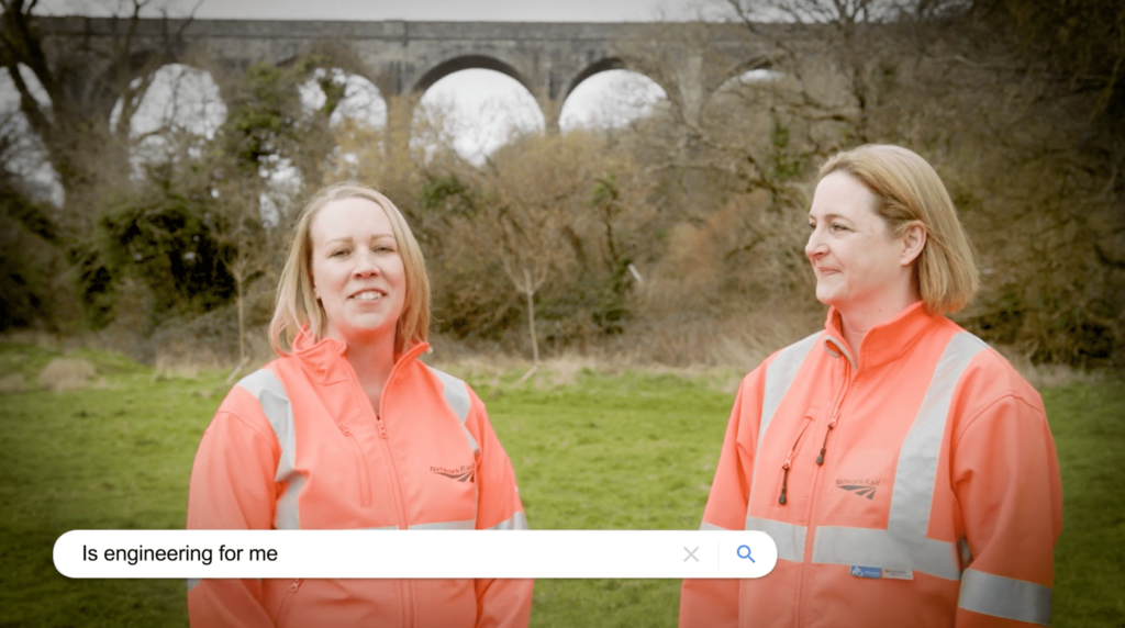 Engineers Clare Rich and Ruth House in front of a viaduct