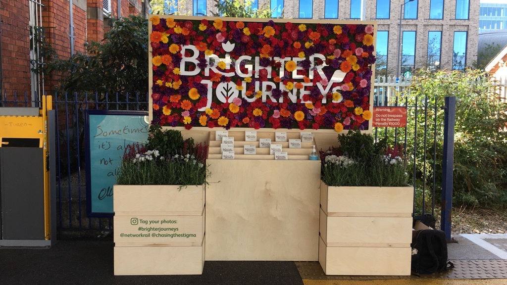 Brighter Journeys flower/sensory installation outside station.