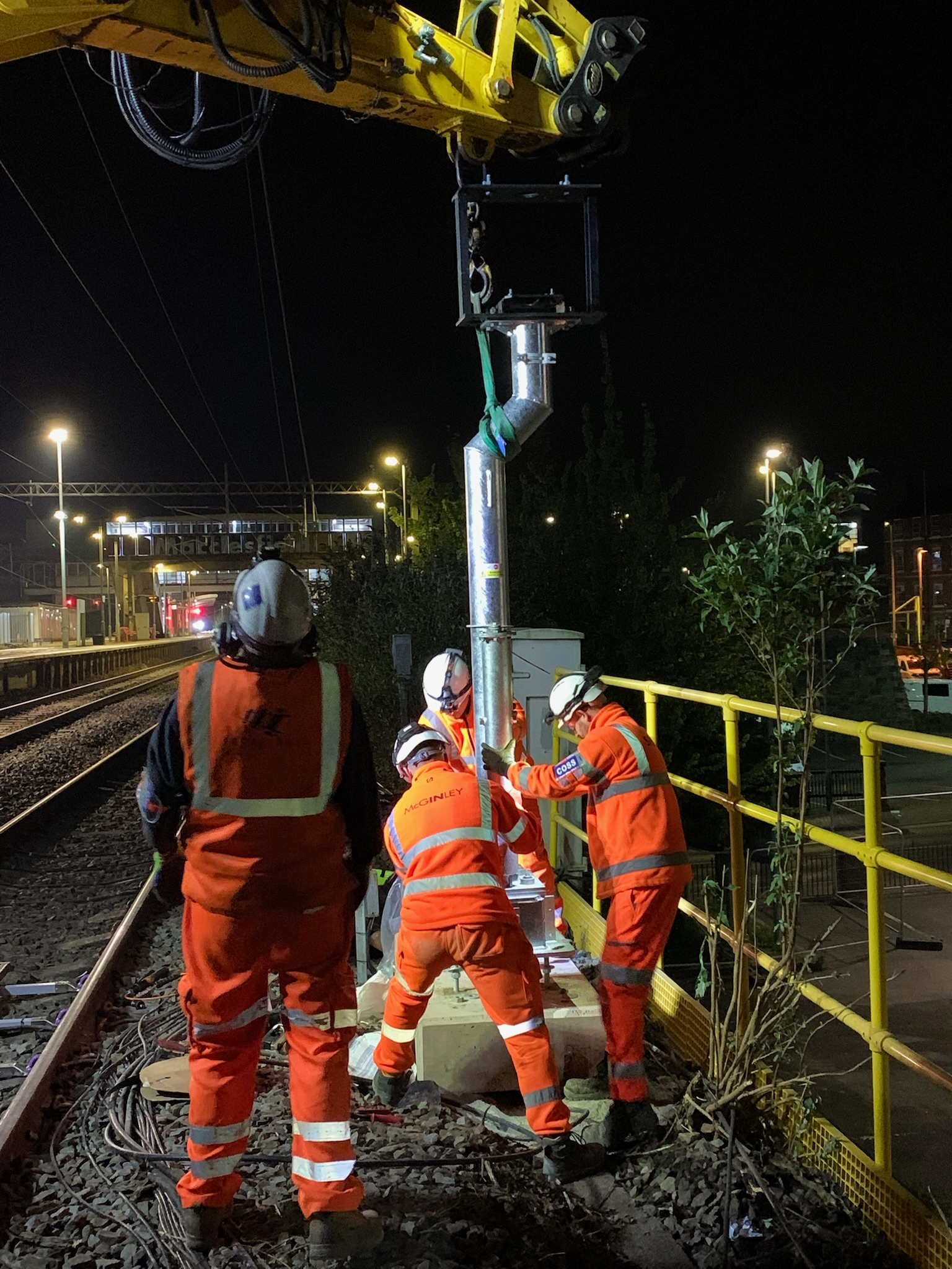 Engineers installing new railway signal post in Macclesfield. 