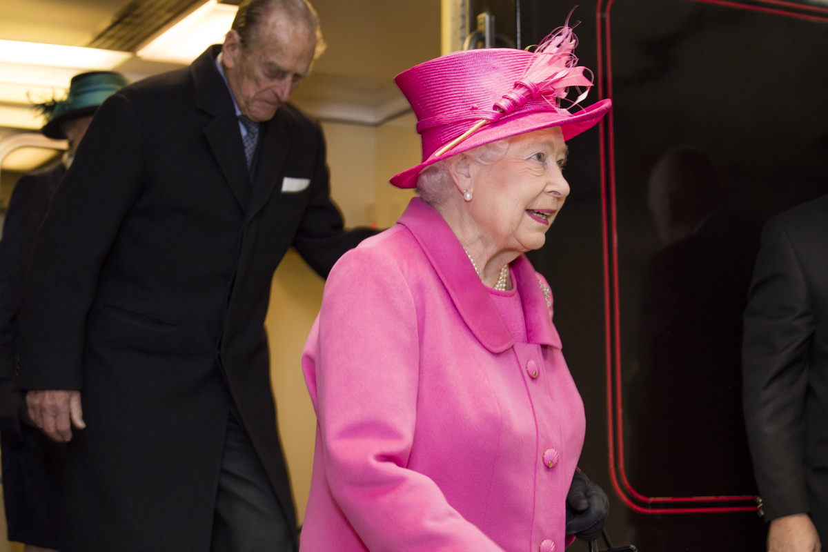 Her Majesty The Queen and His Royal Highness The Duke of Edinburgh disembarking service at Birmingham New Street.