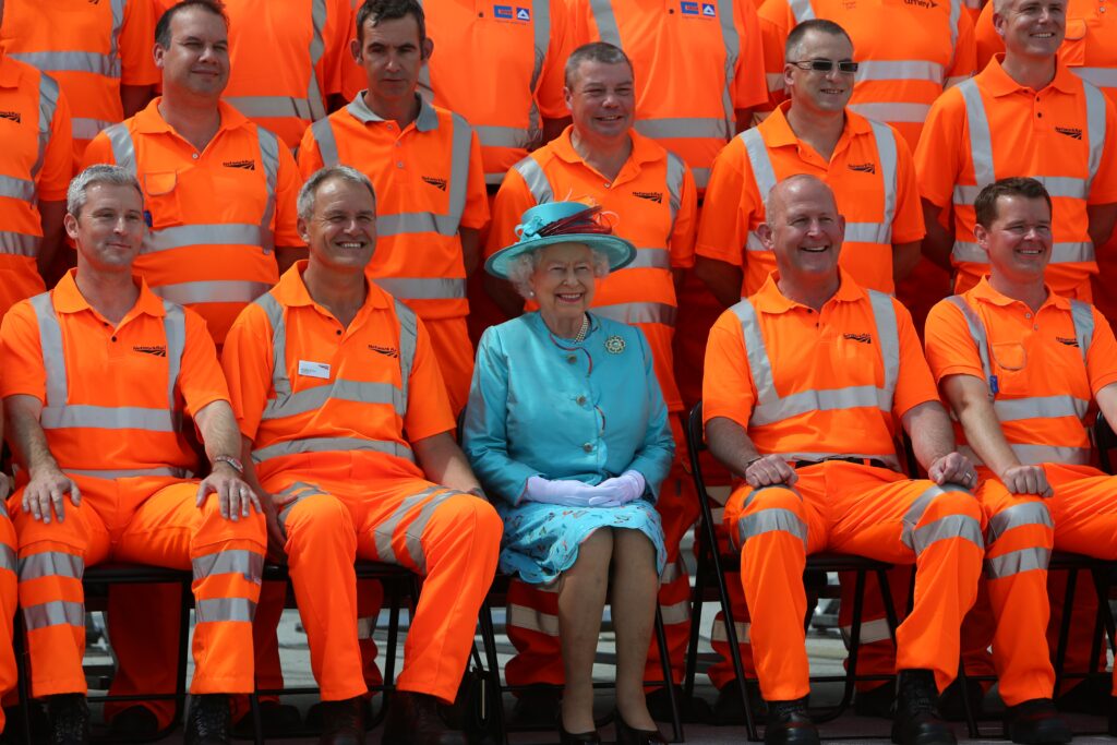Her Majesty The Queen sitting with rail colleagues for special photo taken at Reading railway station.