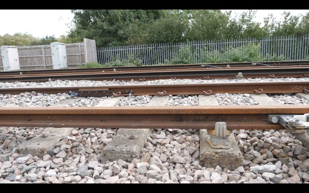 Raised track due to sunken sleeper on dry ground 