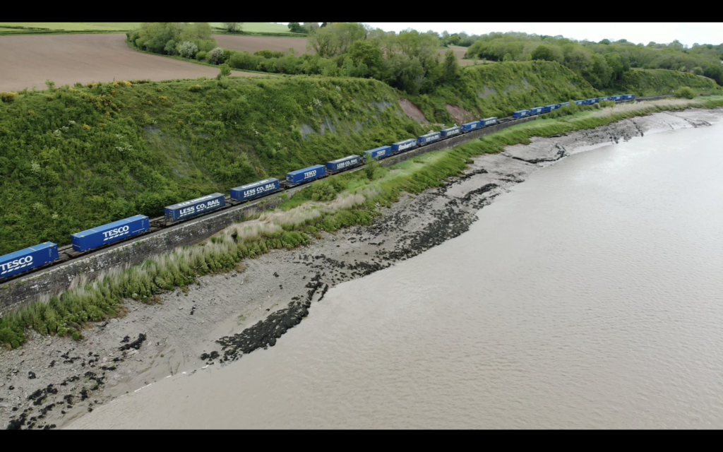 Aerial shot of tesco freight train. 