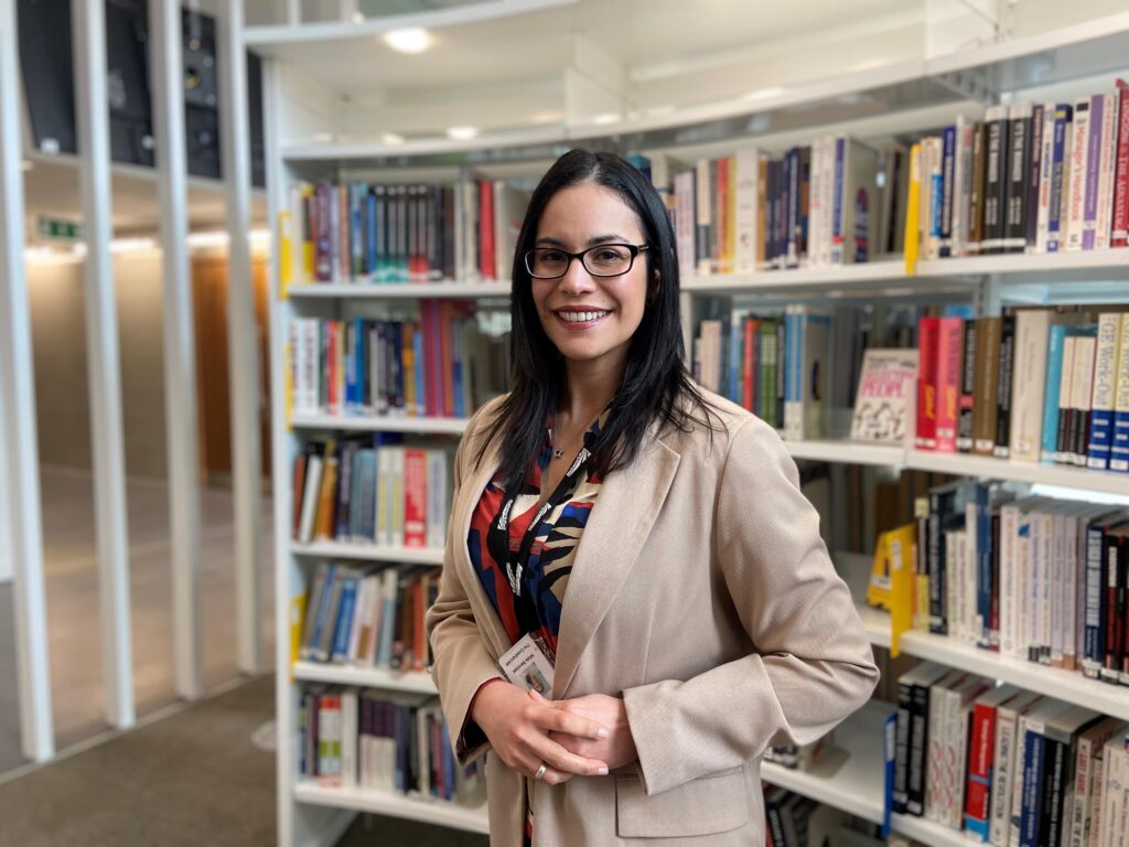 Senior engineer Nilda Sanchez stands in the library at the Network Rail office in Milton Keynes.