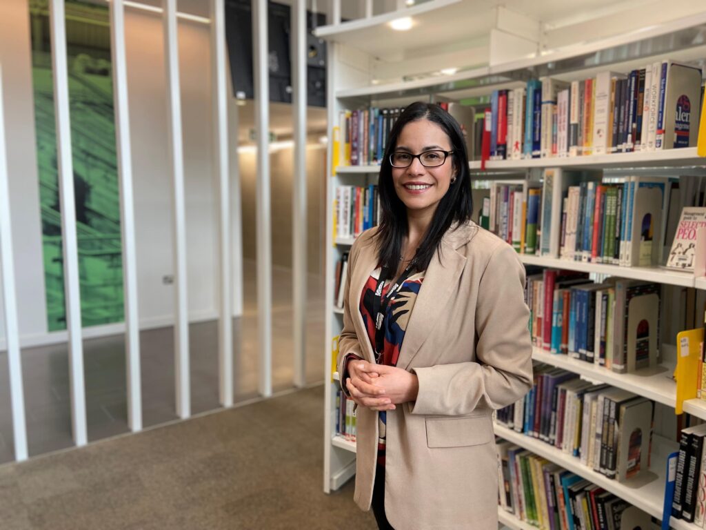 Senior engineer Nilda Sanchez stands in the library at the Network Rail office in Milton Keynes.