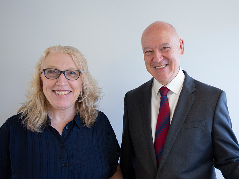 Image of Fiona Taylor and Adrian Hanstock smiling into the camera.