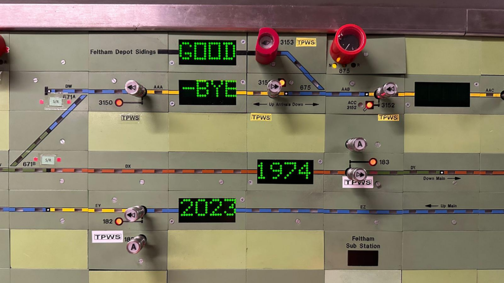 An old signalling panel at Feltham Area Signalling Centre reads 'goodbye, 1974 - 2023'.