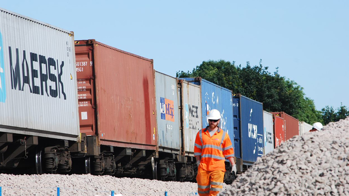 Freight yard with worker