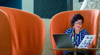 Woman in chair with laptop