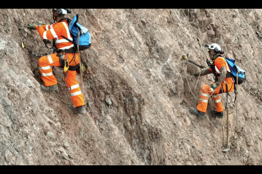 Rope access teams climbing cliff face_SERP
