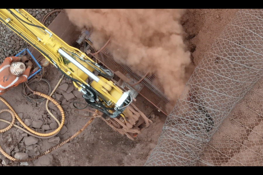 Close up of teams drilling in rock bolts_SERP