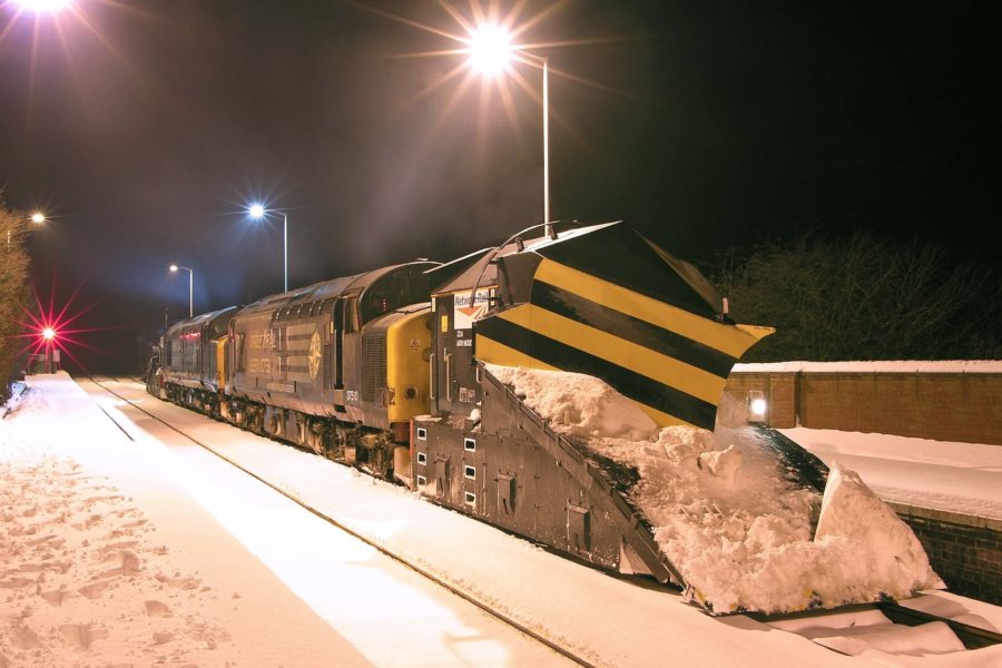 An independent plough locomotive clearing the railway tracks