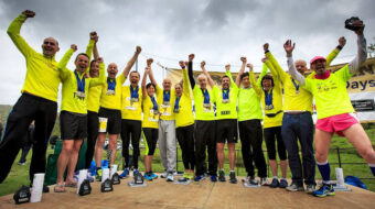 Network Rail workers celebrating at the end of a charity event