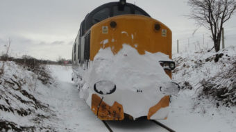 Train on track covered in snow