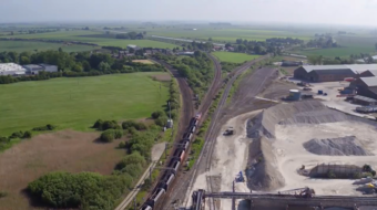 View (looking north east) of Ely North Junction from the aggregate yard, with lines heading to Peterborough (left), King’s Lynn (centre), and Norwich (right).